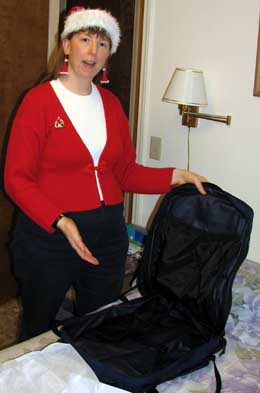 Meps in her Christmas hat with her new Rick Steves' backpack