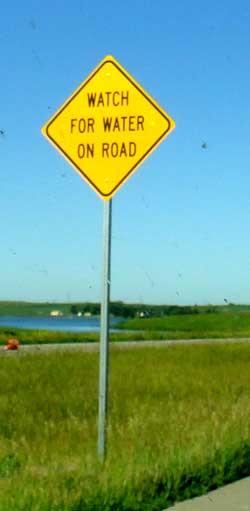 Watch for water on road — yikes!