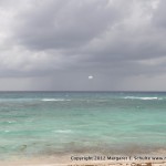 Dramatic sky and parasailer, view from our balcony.