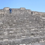 Philip climbs the structure at Chacchoben, with special permission.