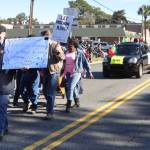 UUCG contingent marches past their church on Gloucester Street