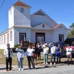 Waving from the front of a church