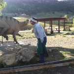 "You pretend to kiss the dinosaur, and I'll take your picture."