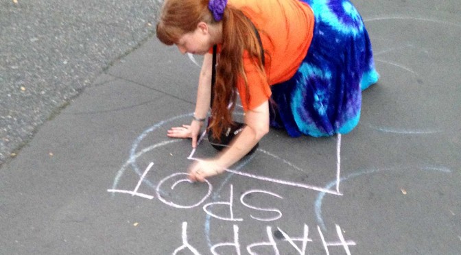 Drawing a happy spot in chalk