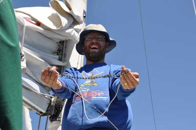 Barry shows the bicycle chain weight that Lee sent down through the mast