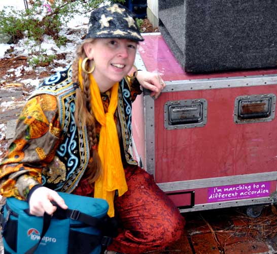 Margaret poses with a bumper sticker that's perfect for her