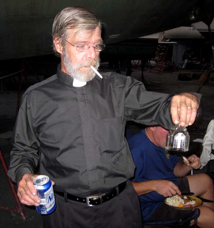 Father Charlie had all the props, including the beer and the cigarette. He generated a few tasteless jokes, too.