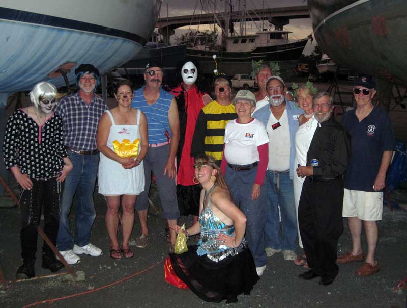 The whole dressed-up gang, complete with jackstands and boats on either side of us. Scary!