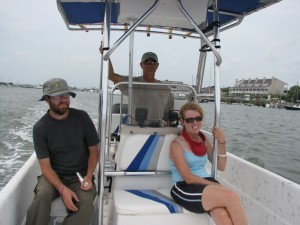 Barry, Kenny, and Nancy on the boat with Beaufort in the background