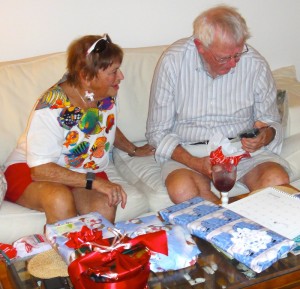 Joy and Dad opening Christmas presents, 2012