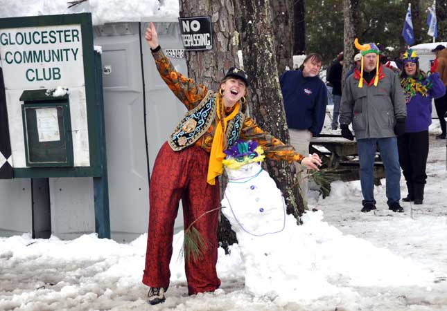 Margaret poses with the Official Mardi Gras Snowperson