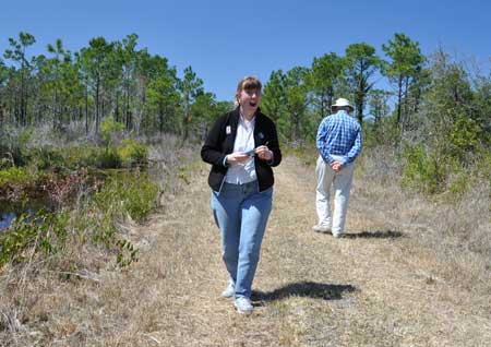 Margaret and her Dad hiking in the wildlife refuge