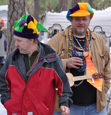 This fellow knew how to accessorize, with a tiny ukelele and a rubboard tie