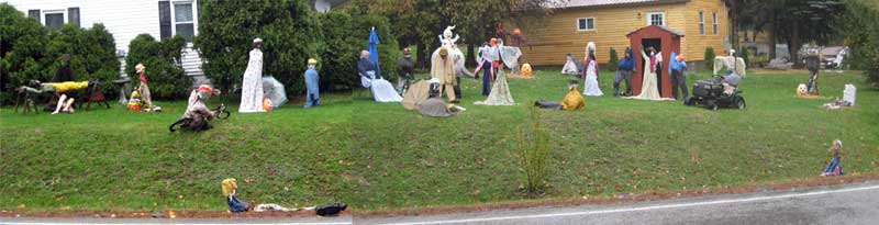 I had to stitch two photos to get 25 of the scarecrows and effigies -- and there were three more on the left!